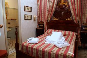 Posteľ alebo postele v izbe v ubytovaní Sitges Royal Rooms