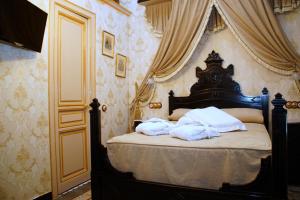 Krevet ili kreveti u jedinici u objektu Sitges Royal Rooms