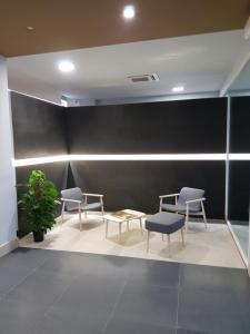 Prostor za sedenje u objektu Netum Hotel