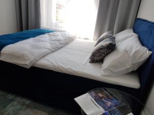 Łóżko lub łóżka w pokoju w obiekcie Proseco Apartments -Self check-in-
