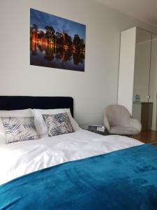 Łóżko lub łóżka w pokoju w obiekcie Proseco Apartments -Self check-in-