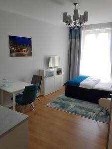 Łóżko lub łóżka w pokoju w obiekcie Proseco Apartments -Self check-in-