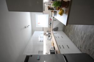 A kitchen or kitchenette at Levendula Nyaraló