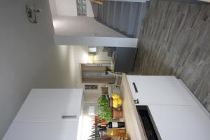 A kitchen or kitchenette at Levendula Nyaraló