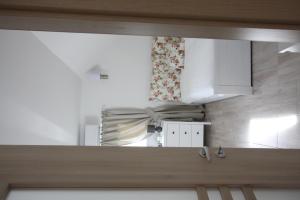 A kitchen or kitchenette at Levendula Nyaraló