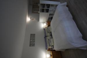 A bed or beds in a room at Levendula Nyaraló