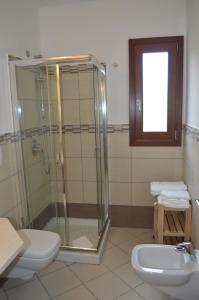 Koupelna v ubytování Guest Rooms Affittacamere + 37 fotografií