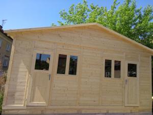 a large wooden shed with windows on top at Prague Retro Challenge and Garden in Prague