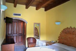 Postel nebo postele na pokoji v ubytování Hotel dell'Ancora