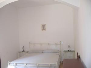 A bed or beds in a room at Villa Aquarium