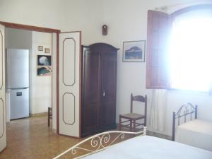 A bed or beds in a room at Villa Aquarium