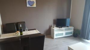 TV a/nebo společenská místnost v ubytování Luna