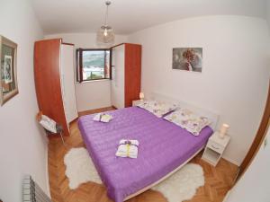 Postel nebo postele na pokoji v ubytování Apartments K & K Dubrovnik
