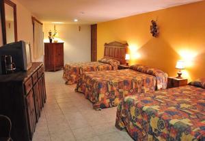 Postel nebo postele na pokoji v ubytování Mirador del Lago