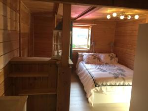 Llit o llits en una habitació de Gîte le Petit Muscat à Eguisheim