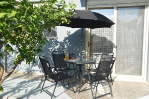 Patio nebo venkovní prostory v ubytování Platoni Elite Villas