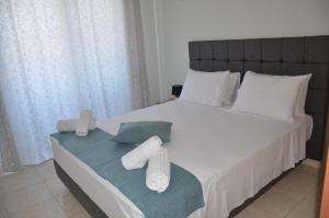 Postel nebo postele na pokoji v ubytování Platoni Elite Villas