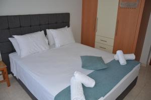 Postel nebo postele na pokoji v ubytování Platoni Elite Villas