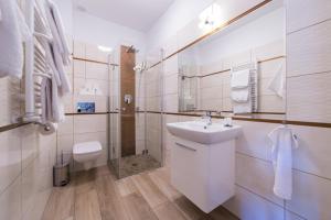 Bilik mandi di Lilu Apartamenty +99 gambar