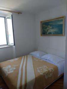 Postel nebo postele na pokoji v ubytování Studio Apartment Tomislava