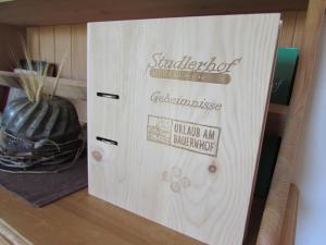 Um certificado, prémio, placa ou documento mostrado em Studlerhof