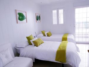 Postel nebo postele na pokoji v ubytování Sea Dreams House