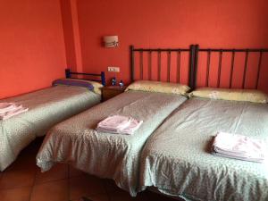 Postel nebo postele na pokoji v ubytování Hotel CTR San Baudelio