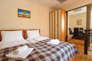 Postel nebo postele na pokoji v ubytování Villa Prestige