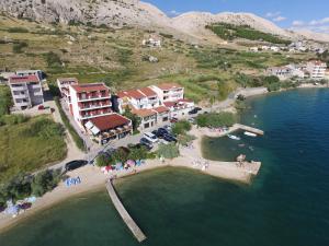 an aerial view of a resort on a lake at Pansion Laguna in Metajna