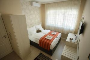 Postel nebo postele na pokoji v ubytování Villa Prestige