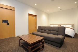 Cama ou camas em um quarto em Hotel Sunriver Shimanto
