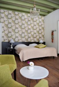 Postel nebo postele na pokoji v ubytování Bed en Brood - Veere