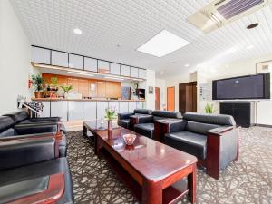 Posezení v ubytování Business Hotel New Nagawajima