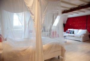 Postel nebo postele na pokoji v ubytování Bed en Brood - Veere