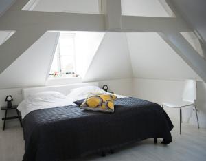 Postel nebo postele na pokoji v ubytování Bed en Brood - Veere