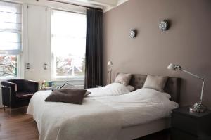 Postel nebo postele na pokoji v ubytování Bed en Brood - Veere