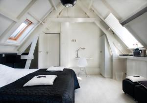 Postel nebo postele na pokoji v ubytování Bed en Brood - Veere