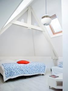 Postel nebo postele na pokoji v ubytování Bed en Brood - Veere
