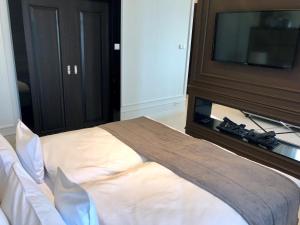 Postel nebo postele na pokoji v ubytování Hotel Mansor
