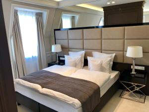 Postel nebo postele na pokoji v ubytování Hotel Mansor + 33 fotografií