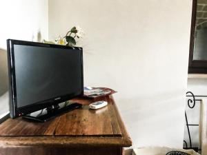 En tv och/eller ett underhållningssystem på Agriturismo Baccole