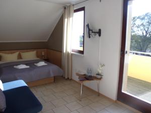 Postel nebo postele na pokoji v ubytování Hotel Bergmühle