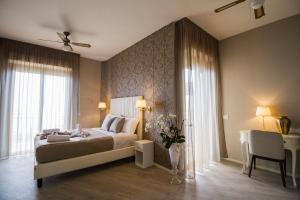 Postel nebo postele na pokoji v ubytování Hotel Lady Mary