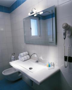 Een badkamer bij Hotel Bella Italia