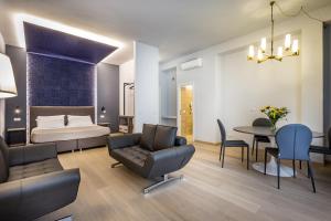 A bed or beds in a room at Blu Notte Guest House