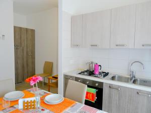 A kitchen or kitchenette at Palazzina del sole