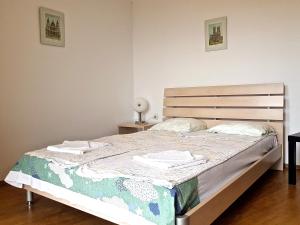 Łóżko lub łóżka w pokoju w obiekcie Belvedere Apartments