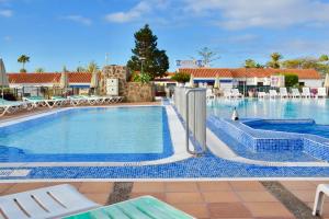 Bazén v ubytování Santa Clara Bungalows nebo v jeho okolí