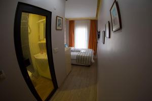 Postel nebo postele na pokoji v ubytování Ottoman Time Hotel
