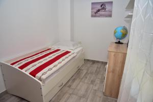Łóżko lub łóżka w pokoju w obiekcie Villa Rubesco